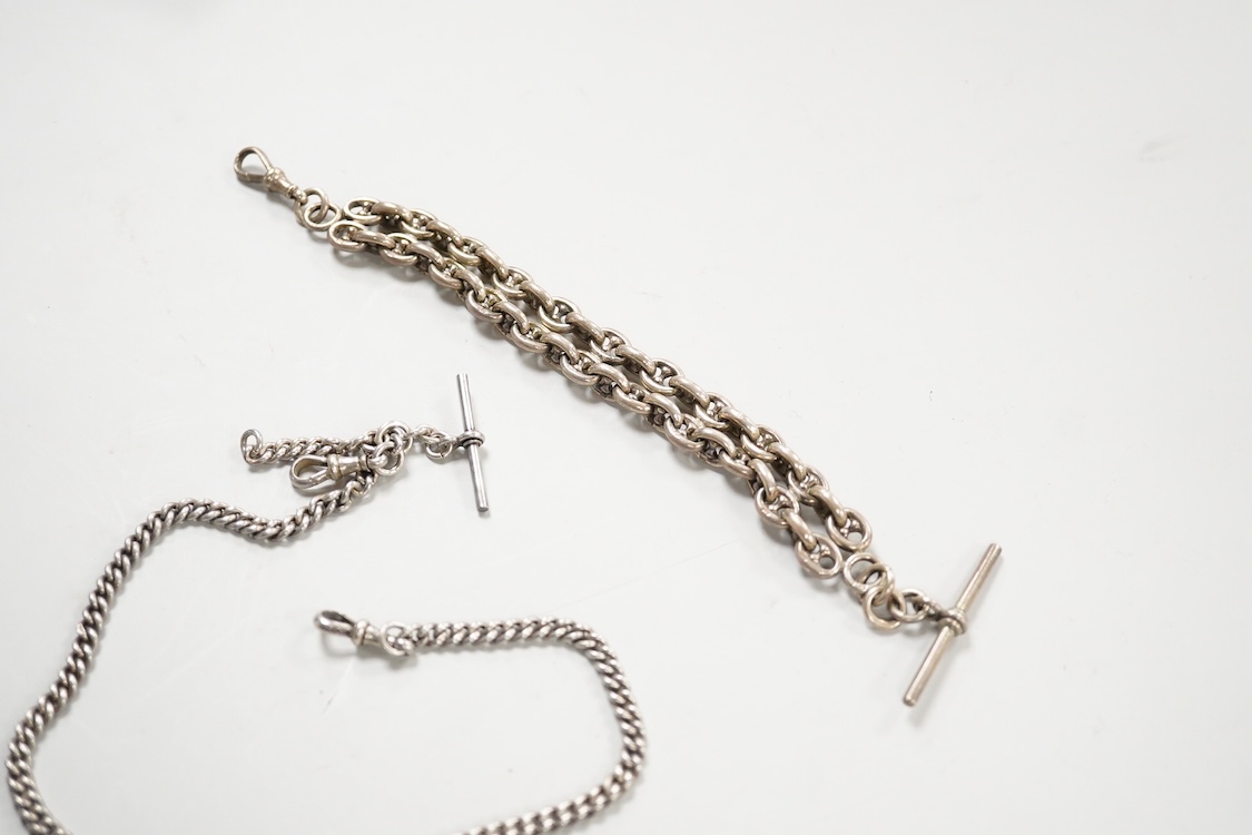 A two row chain link silver albert, 21cm and one other longer silver curb link albert, 37cm.